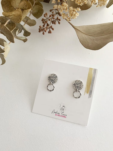 Boucles d'oreilles rondes et torsades en argent